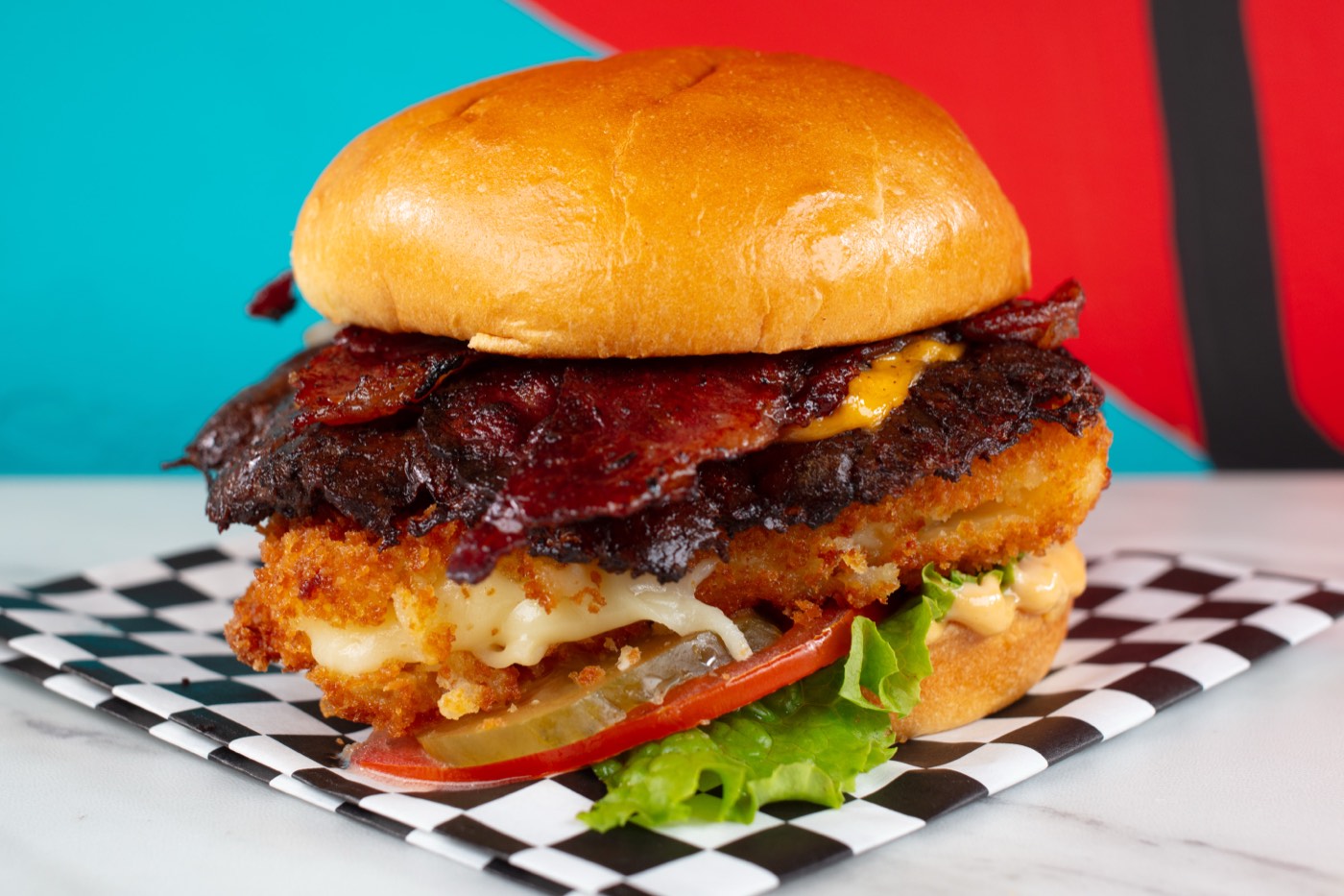 The Showstopper — smash patty with deep-fried cheese crust and beef bacon